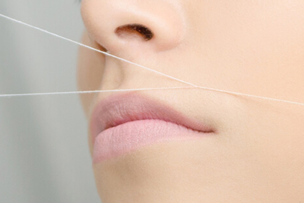 Threading de buço no salão Márcia Vieira Cabeleireiro, no Porto