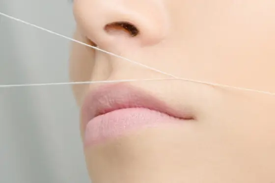 Threading de buço no salão Márcia Vieira Cabeleireiro, no Porto